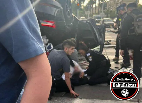 Qırmızı işıqda keçən nazirin maşını aşdı - FOTO